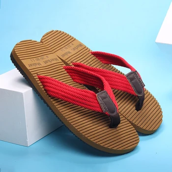 2020 verano masaje de rayas zapatillas de los hombres de desgaste suave de eva inferior de la clásica tendencia de tótem chanclas de la playa de la juventud sandalias